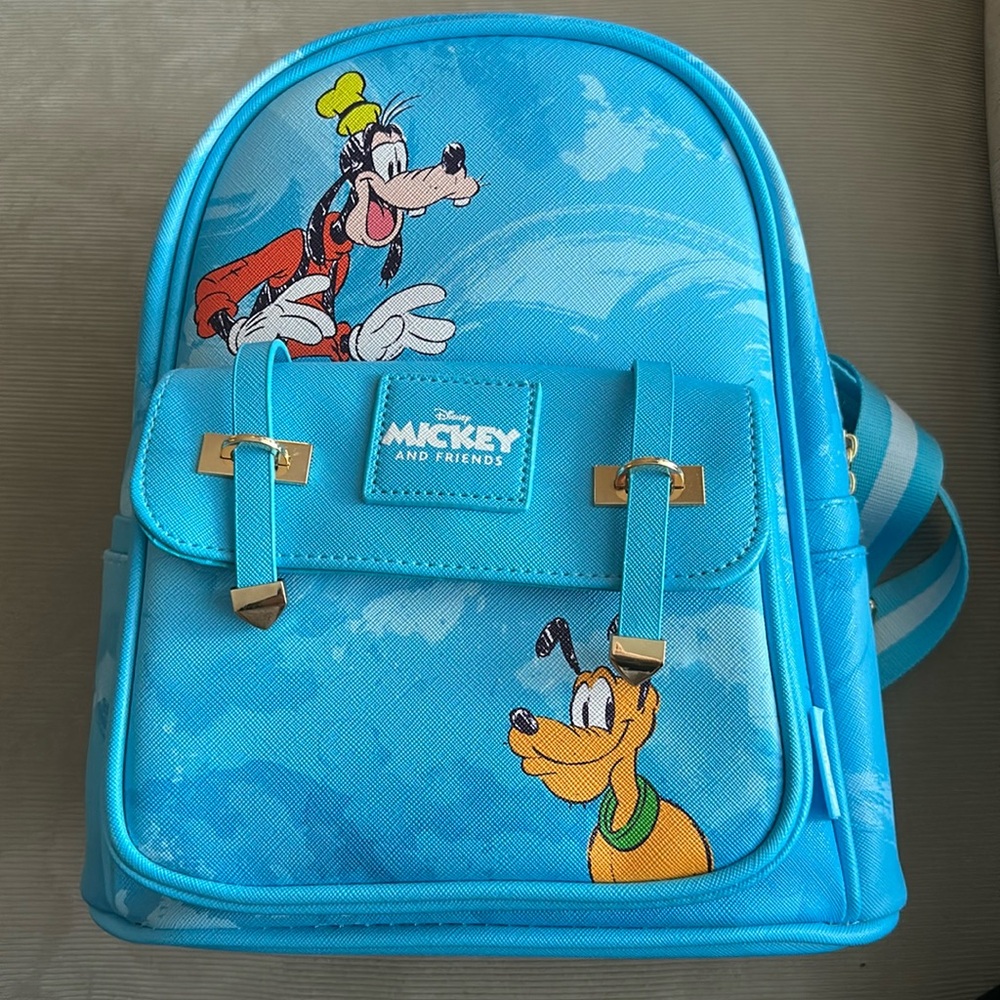 NWT-Disney/blue Goofy and Pluto in a Mickey and Friends mini backpack.
